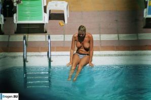 Girls sunbathe topless near the pool. Part 2. Thumb 13