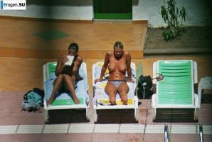 Girls sunbathe topless near the pool. Part 2. Thumb 15