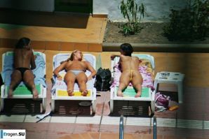 Girls sunbathe topless near the pool. Part 2. Thumb 28