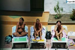 Girls sunbathe topless near the pool. Part 2. Thumb 37