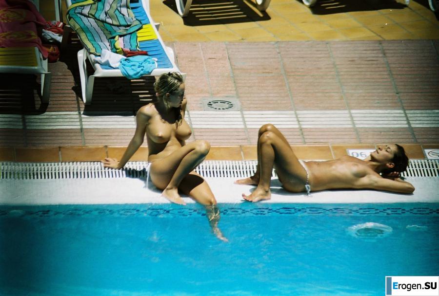 Girls sunbathe topless near the pool. Part 3. Photo 26