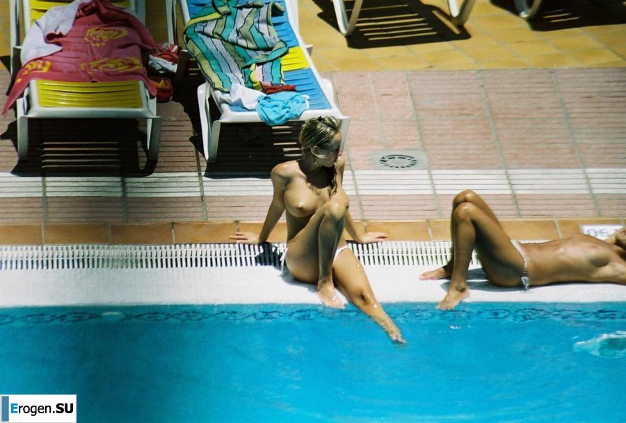 Girls sunbathe topless near the pool. Part 3. Photo 27