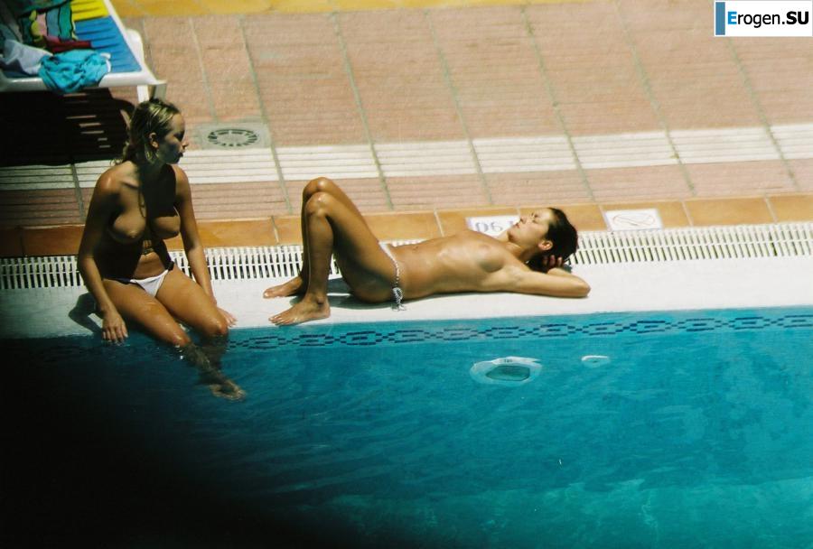 Girls sunbathe topless near the pool. Part 3. Photo 28