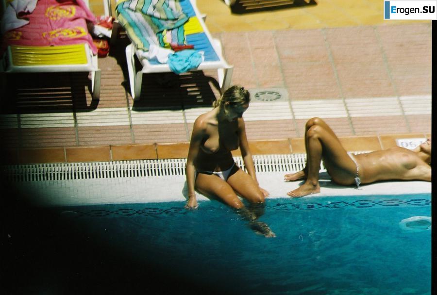 Girls sunbathe topless near the pool. Part 3. Photo 29