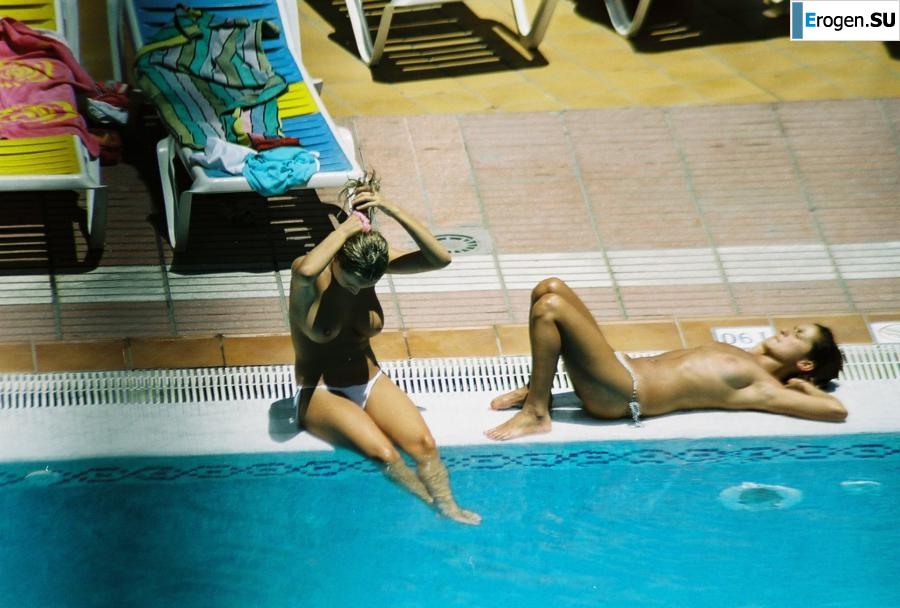 Girls sunbathe topless near the pool. Part 3. Photo 32