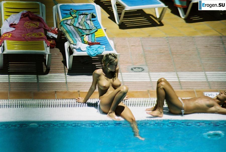 Girls sunbathe topless near the pool. Part 3. Photo 33