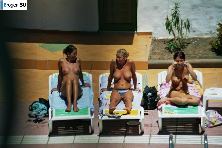Girls sunbathe topless near the pool. Part 3. Photo 6