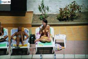 Girls sunbathe topless near the pool. Part 3. Thumb 16