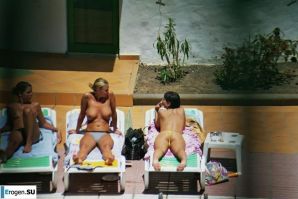 Girls sunbathe topless near the pool. Part 3. Thumb 9