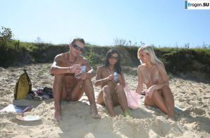 Three nudists on the river bank. Thumb 11