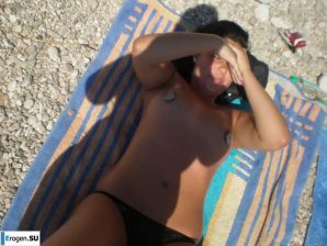 on the beach between us girls. Thumb 7