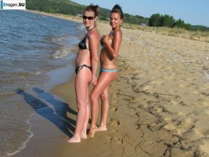 tanned girlfriends on a rocky shore. Thumb 13
