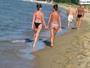 tanned girlfriends on a rocky shore. Thumb 16