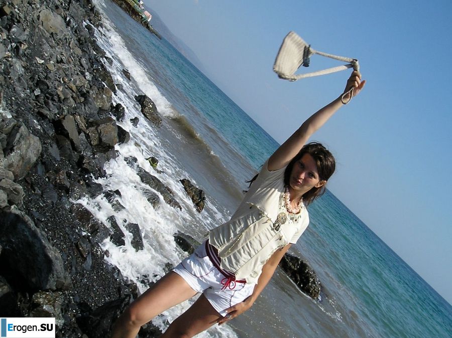 without a swimsuit on a rocky shore. Photo 38