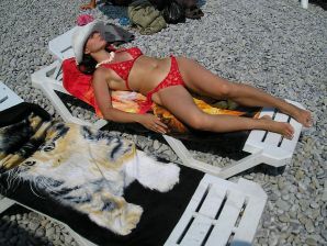 without a swimsuit on a rocky shore. Thumb 24