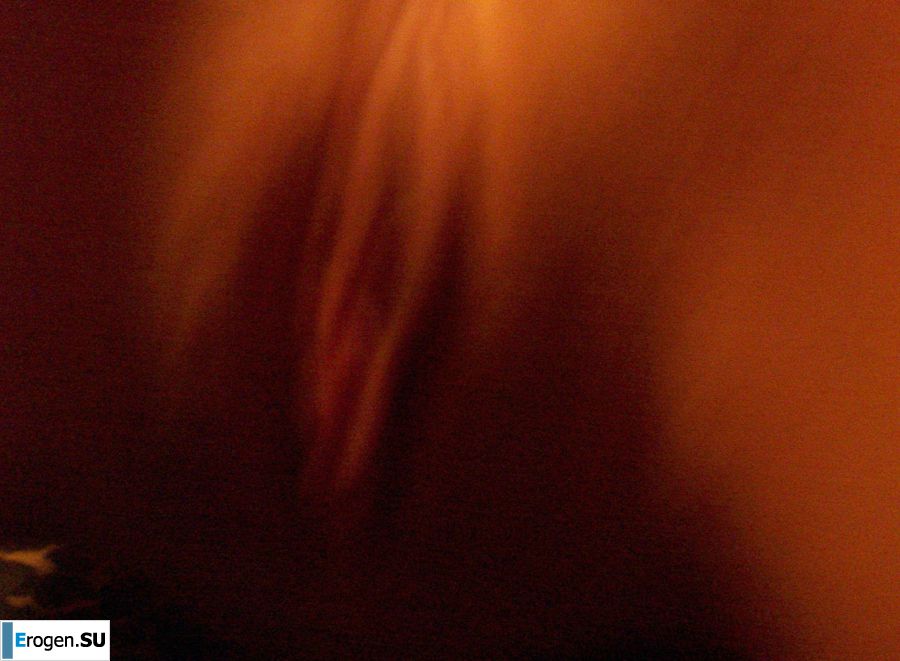 An attractive girl poses for cancer, showing her labia. Photo 16