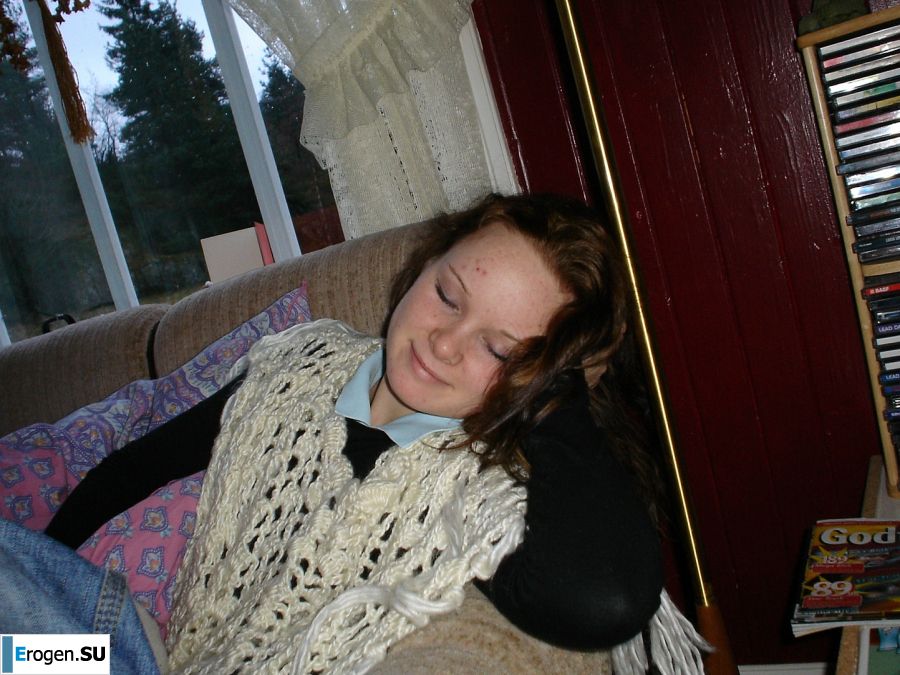 A blue-eyed minx with a pierced nipple plays with her panties. Slide 2