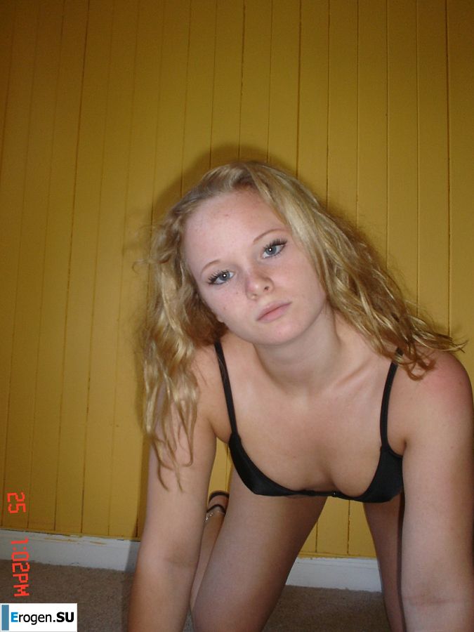 A blue-eyed minx with a pierced nipple plays with her panties. Slide 28