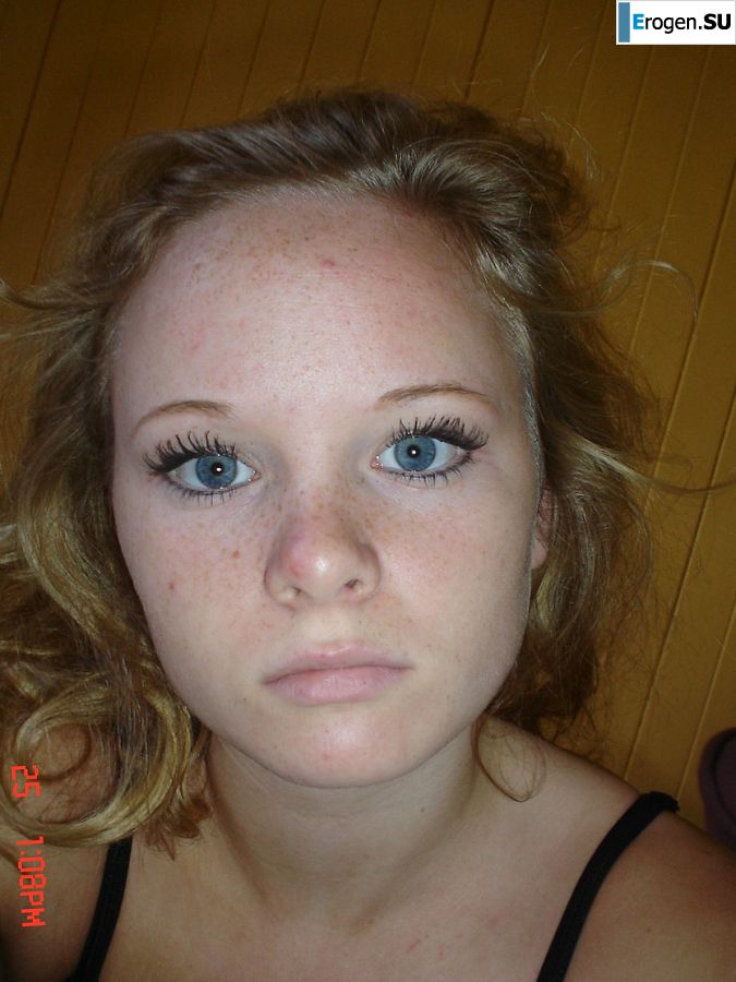 A blue-eyed minx with a pierced nipple plays with her panties. Slide 31