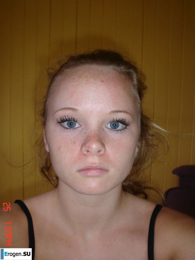 A blue-eyed minx with a pierced nipple plays with her panties. Slide 32
