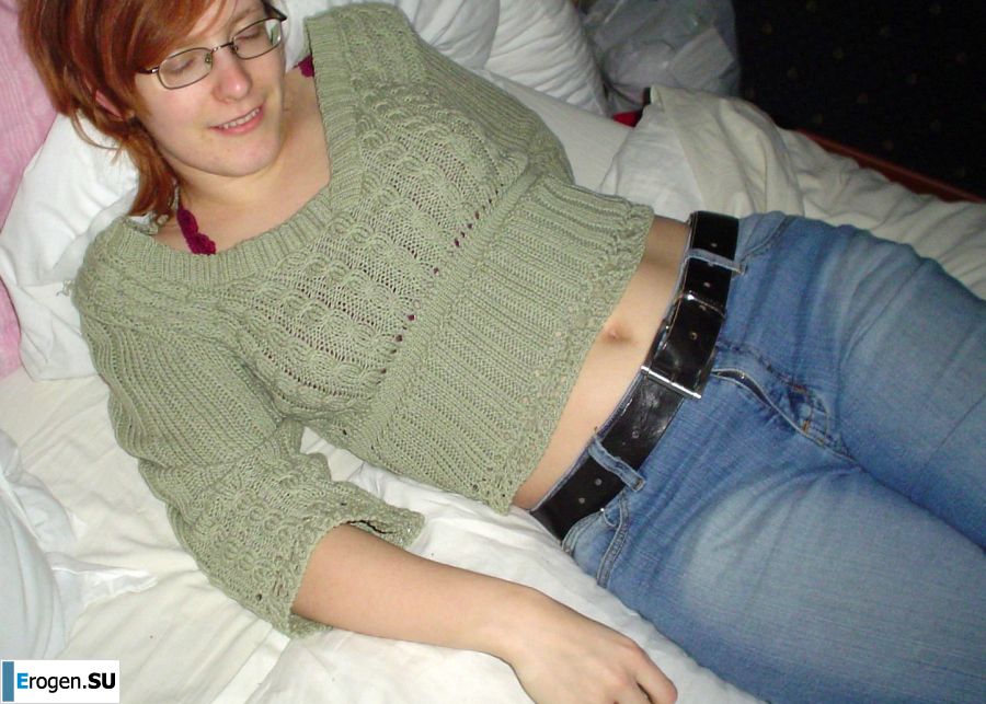 A red-haired student with glasses spread her legs in lace stockings and showed a pussy. Photo 25