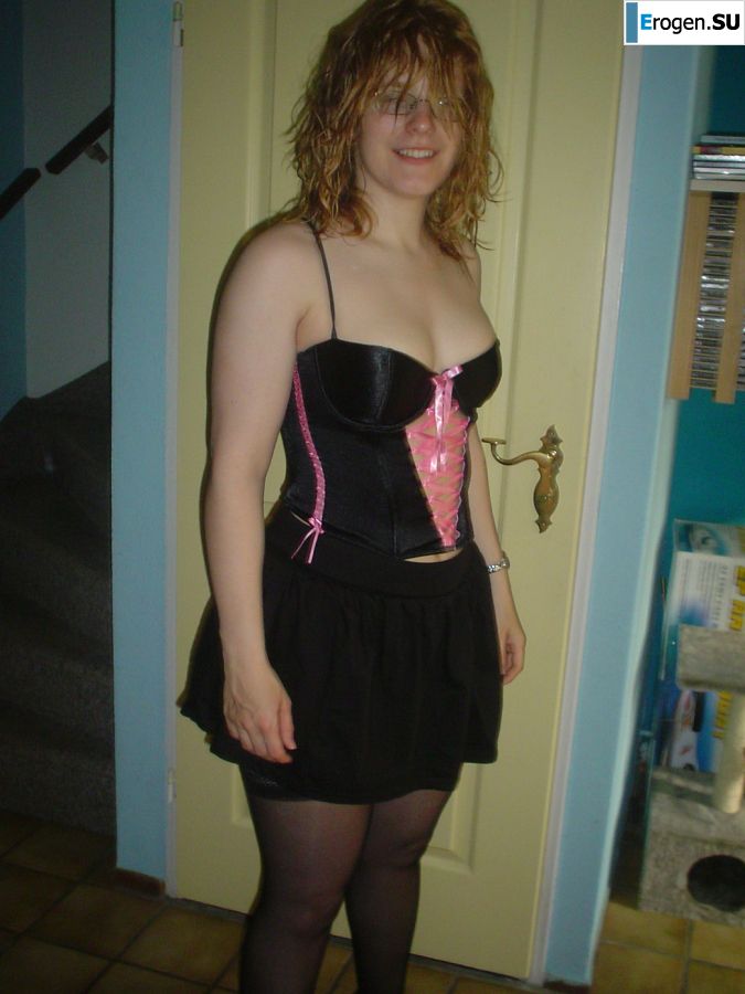 A red-haired student with glasses spread her legs in lace stockings and showed a pussy. Photo 33