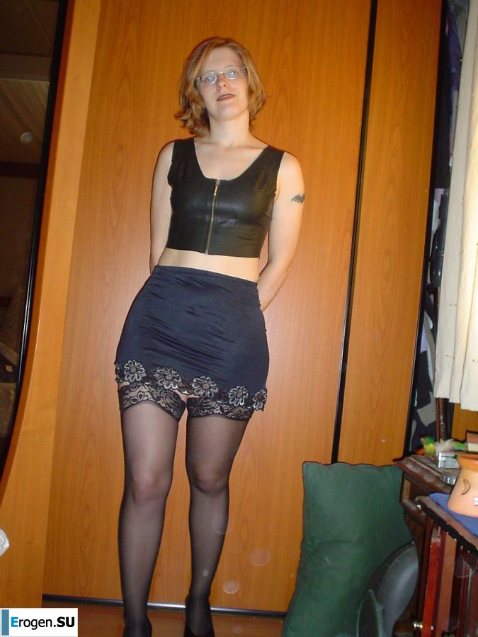 A red-haired student with glasses spread her legs in lace stockings and showed a pussy. Photo 8