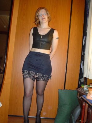 A red-haired student with glasses spread her legs in lace stockings and showed a pussy. Thumb 8