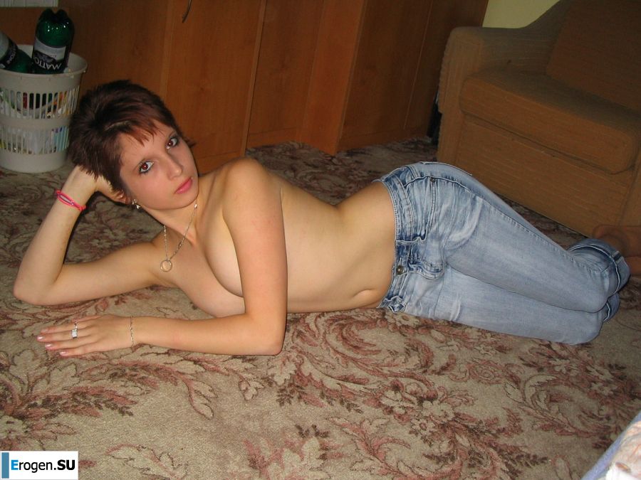 A slender girl with short hair took off everything except panties. Slide 4