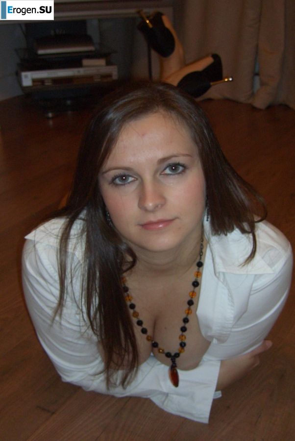 An appetizing chick lowered her panties by the fireplace. Photo 4