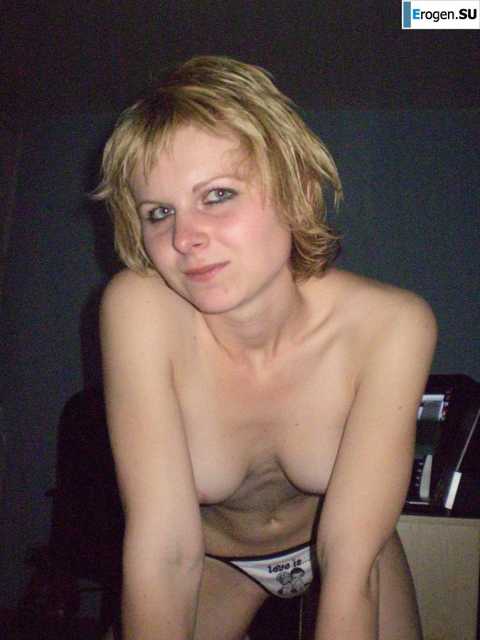 A young blonde in red lingerie stood up with cancer and spreads her pussy. Slide 6
