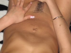 A tanned brunette with a firm body undressed and showed an intimate haircut. Thumb 18