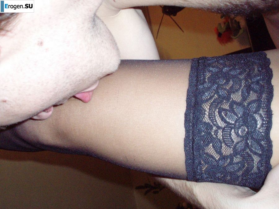 A woman caresses herself spreading her legs apart on the camera. Photo 37