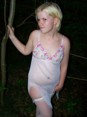 Appetizing magnificent blonde spread her legs right on the grass. Thumb 15