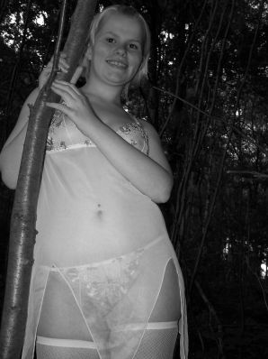 Appetizing magnificent blonde spread her legs right on the grass. Thumb 20