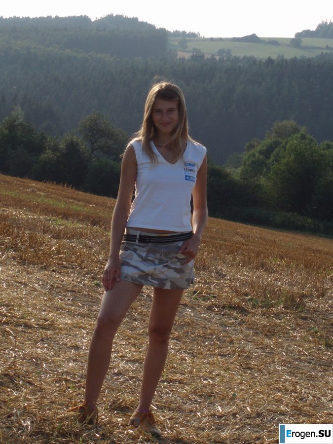 A woman caresses herself spreading her legs apart on the camera. Part 2. Slide 16