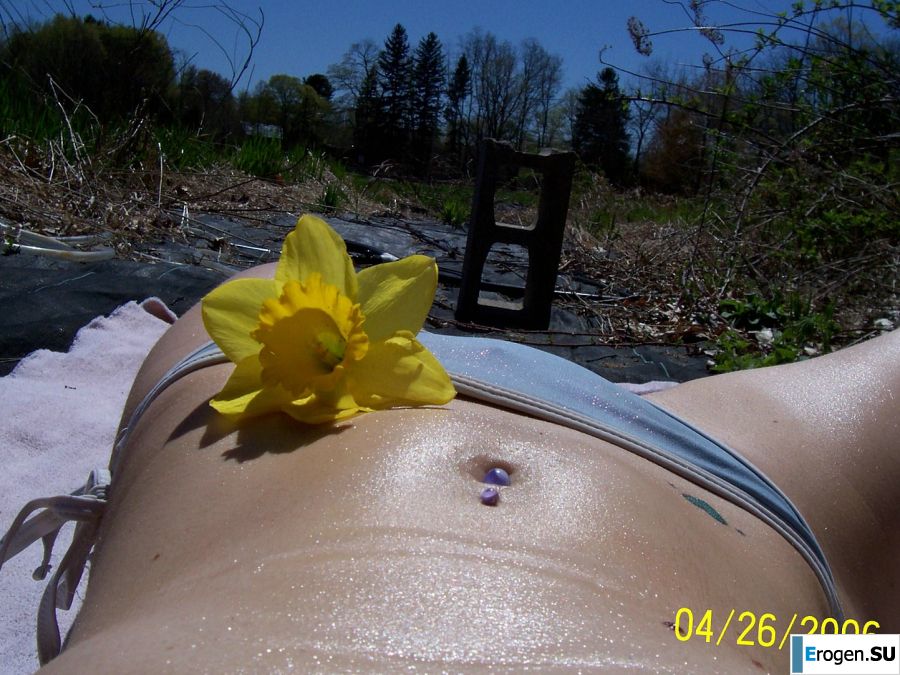 Passionate minx dances striptease in nature with a snake. Slide 16