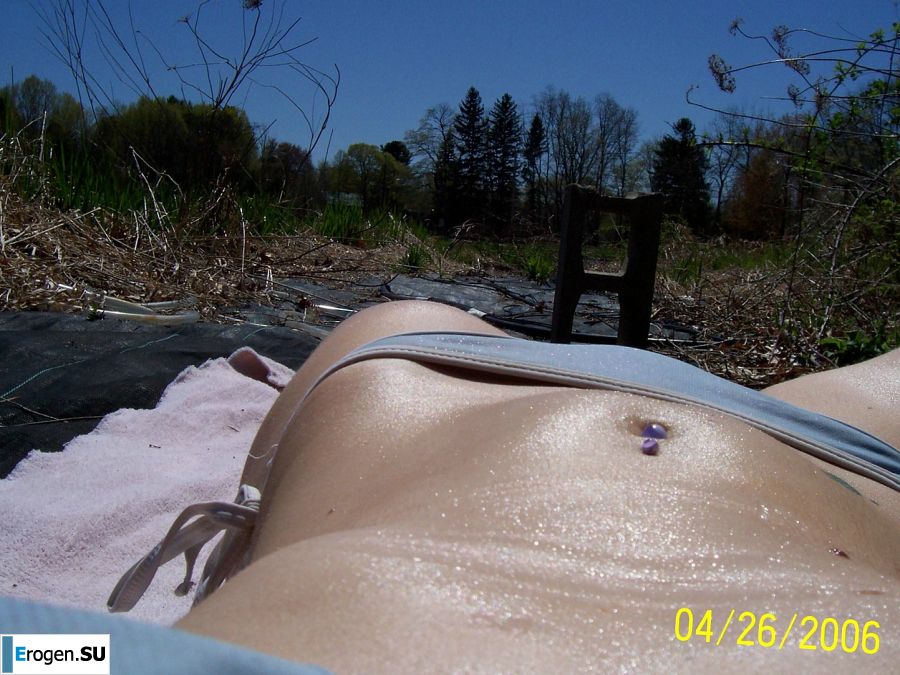 Passionate minx dances striptease in nature with a snake. Slide 28