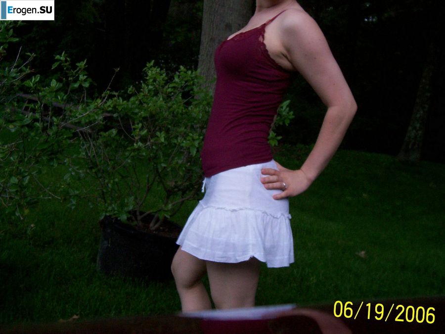 Passionate minx dances striptease in nature with a snake. Slide 8
