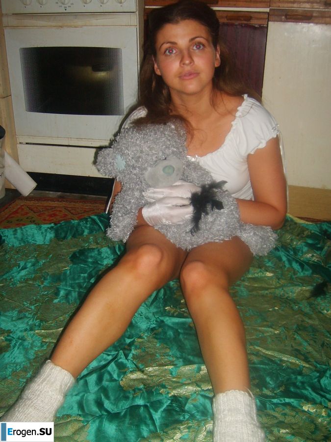 A luxurious lady performs striptease with exquisite lingerie and shows her breasts. Photo 37