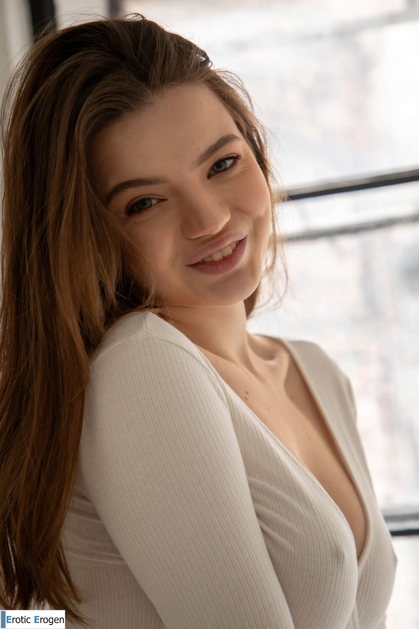 Toree in White Bodysuit. Slide 2