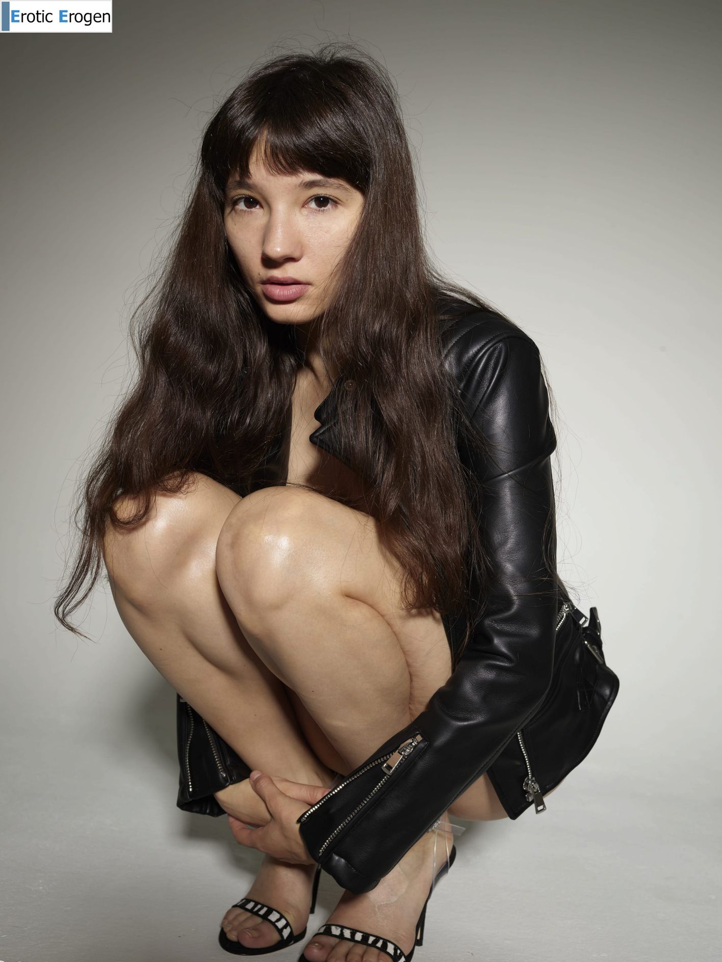 Katya V in Leather And Skin. Slide 24